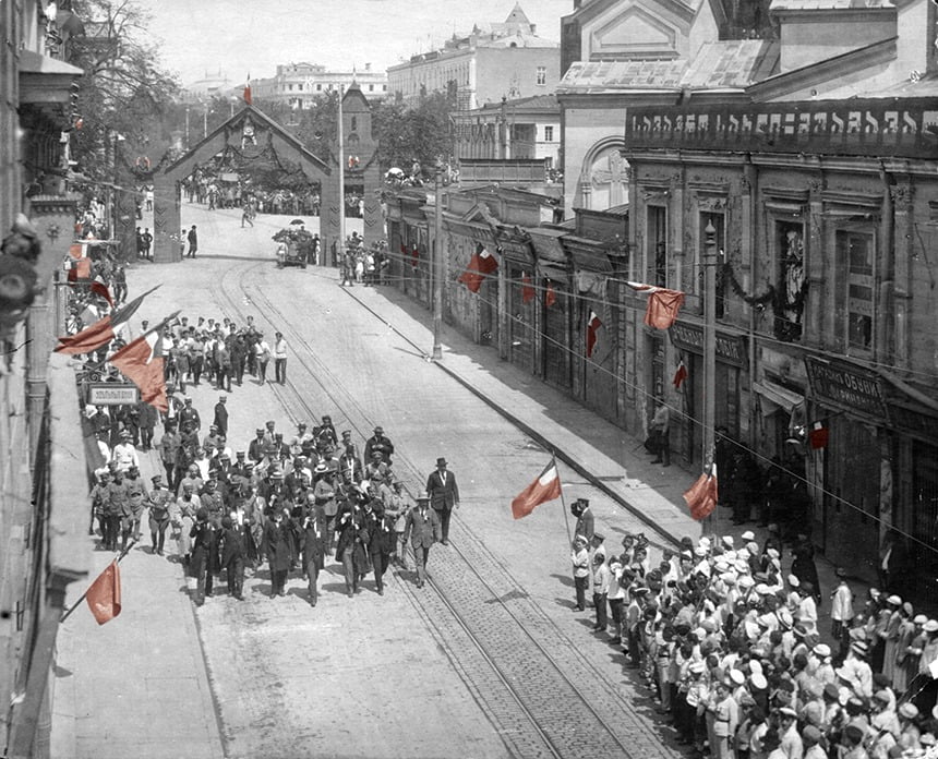 Leaders of the Georgian Democratic Republic marching through Palace Street (Rustaveli Ave.) of Tbilisi on 26 May 1919, celebrating the first anniversary of Georgia’s independence. Photo retrieved from the National Archive of Georgia, recolored at Civil.ge. ~
